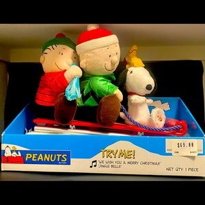 Peanuts Snoopy Linus & Charlie Brown on Sled Musical Holiday Decor